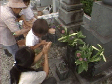 praying at the family grave