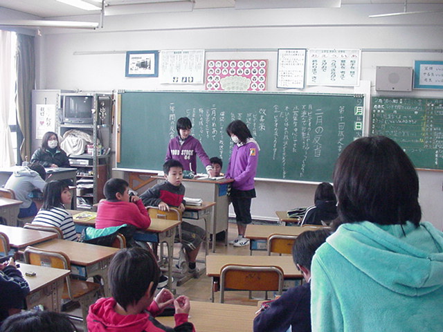 students in the broadcast committee review the month of February,  the last year, and the upcoming month